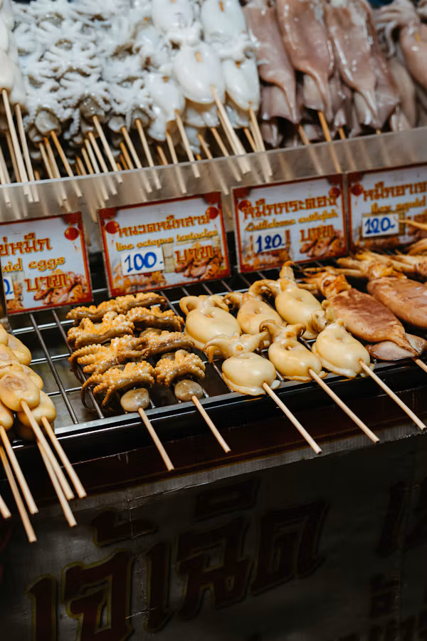 Skewers of grilled seafood at a night market stall