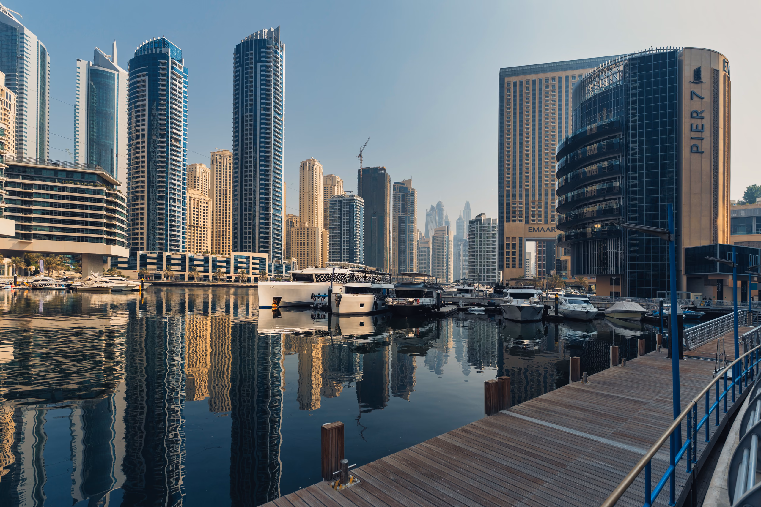 Dubai Marina, lined with glass towers and a boardwalk
