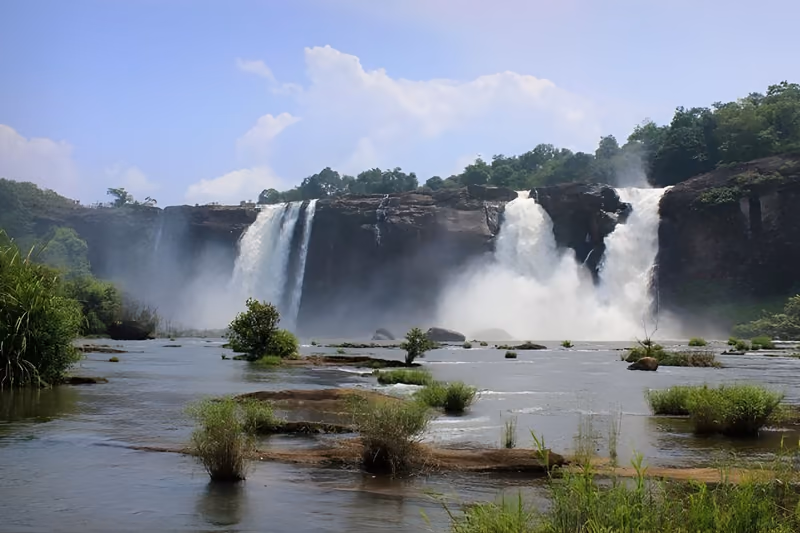 Athirappilly falls dropping through the green hills of Chalakudy