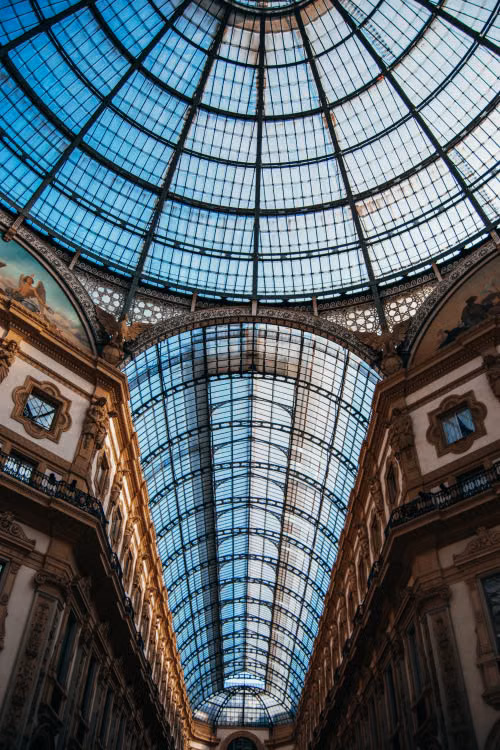 The glass roof of a grand arcade seen from below